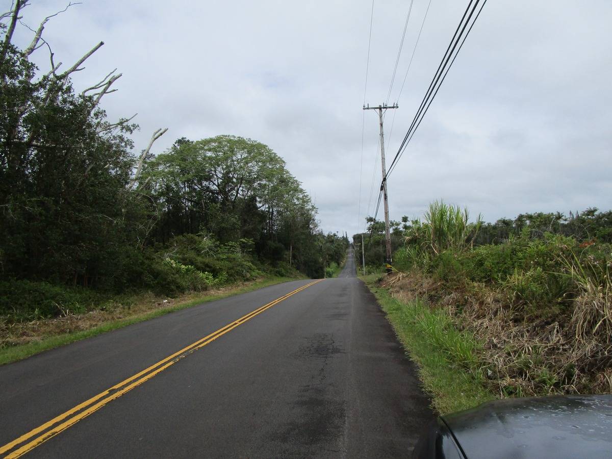 78 E South Kulani Road Mountain View, HI 96771 - Photo 6 of 6 a view of a road with a yard