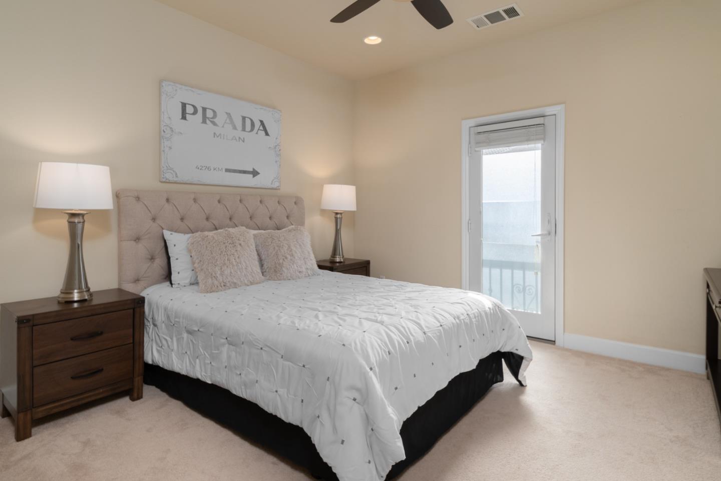 545 Holthouse Terrace Sunnyvale, CA 94087 - Photo 12 of 24 a bedroom with a bed and a night stand