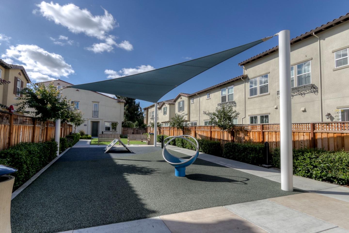 545 Holthouse Terrace Sunnyvale, CA 94087 - Photo 21 of 24 a building outdoor space with patio furniture and potted plants