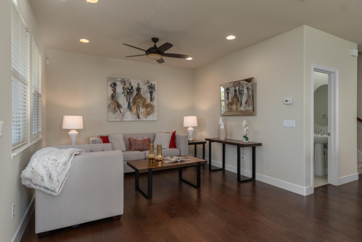 545 Holthouse Terrace Sunnyvale, CA 94087 - Photo 8 of 24 a living room with furniture and a wooden floor