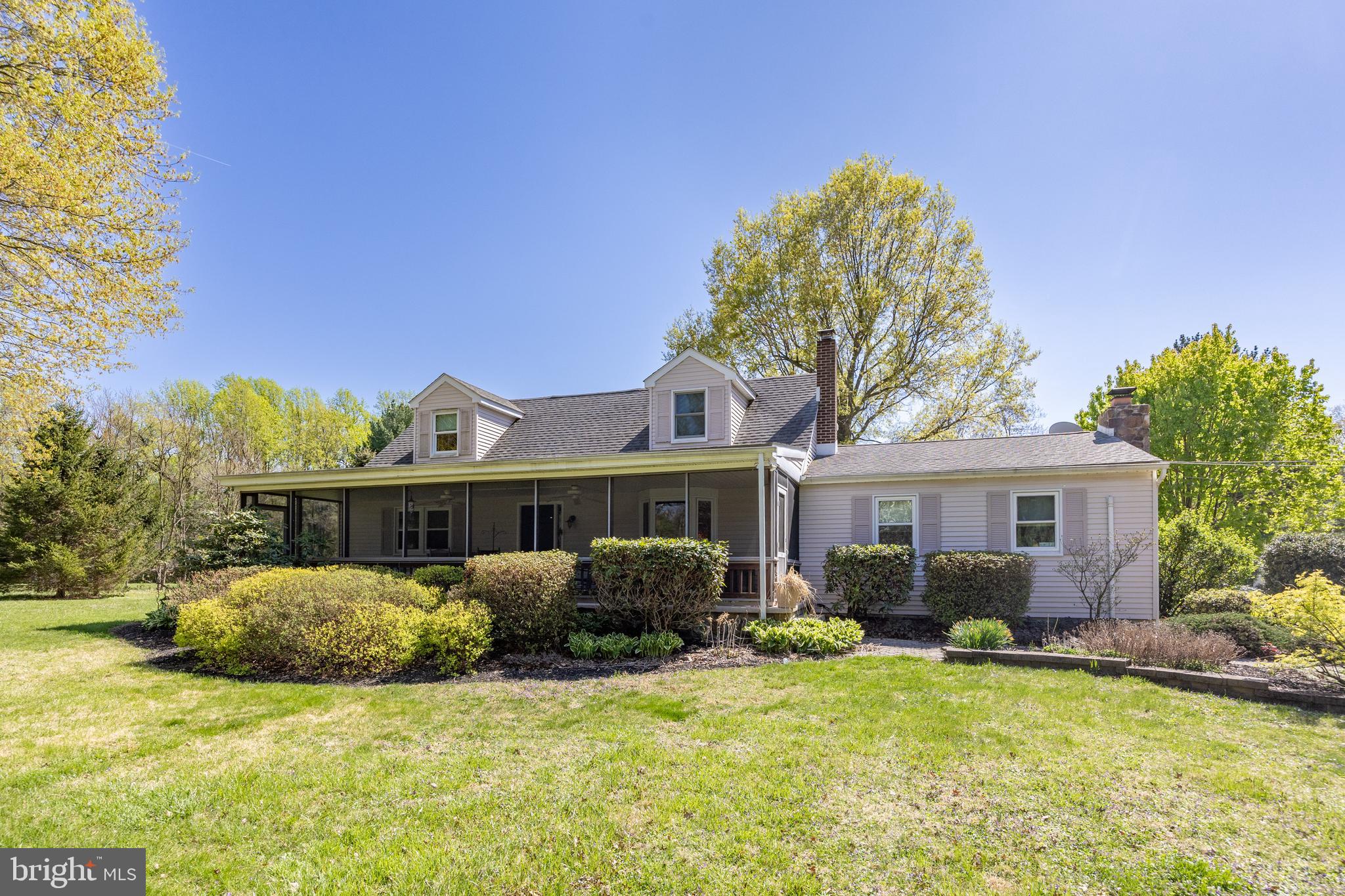 3076 Conestoga Road Glenmoore, PA 19343 - Photo 2 of 31 a front view of a house with a yard and garage