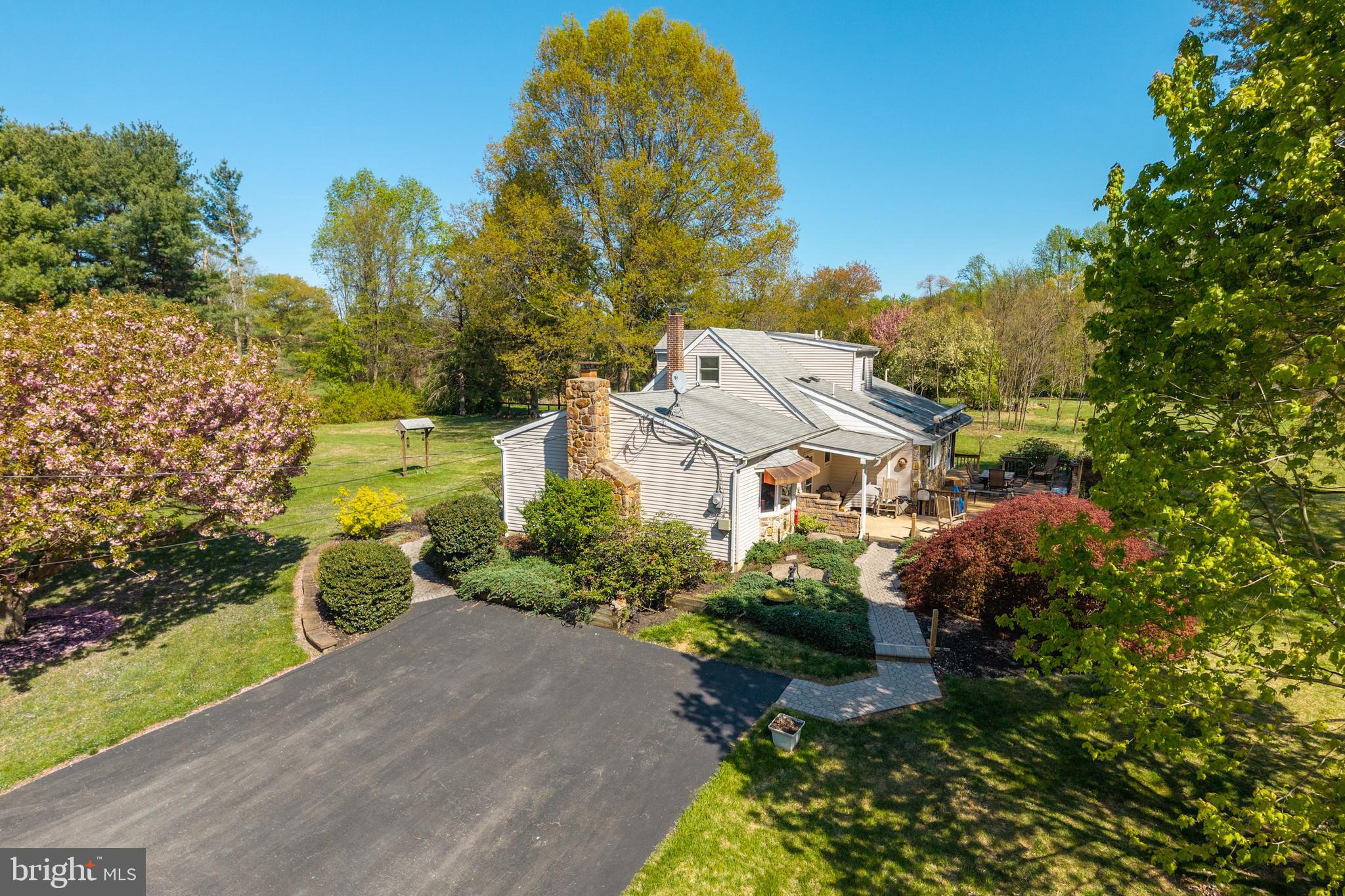 3076 Conestoga Road Glenmoore, PA 19343 - Photo 30 of 31 an aerial view of a house with a garden