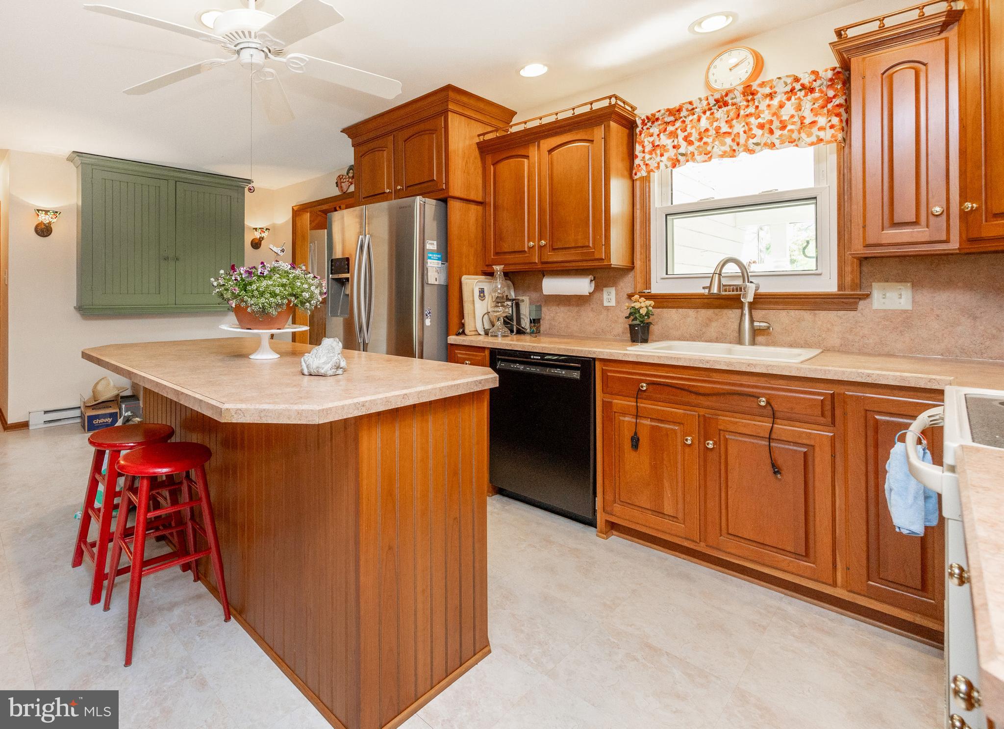 3076 Conestoga Road Glenmoore, PA 19343 - Photo 4 of 31 a kitchen with stainless steel appliances granite countertop a sink a stove and a refrigerator