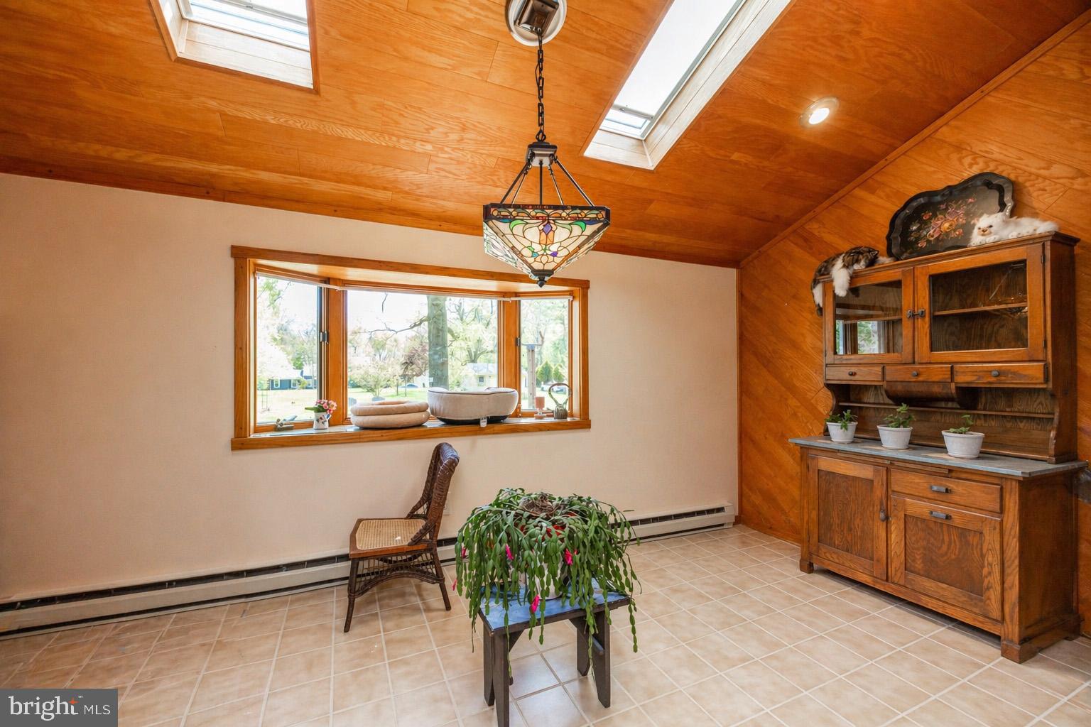 3076 Conestoga Road Glenmoore, PA 19343 - Photo 7 of 31 a room with chandelier fan and windows
