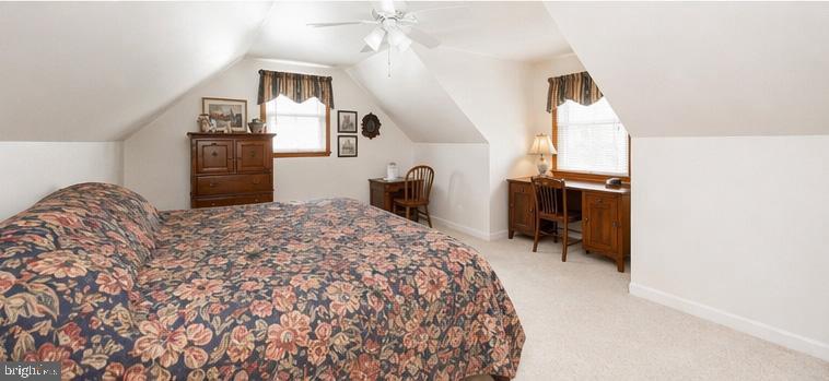 3076 Conestoga Road Glenmoore, PA 19343 - Photo 10 of 31 a bedroom with a bed dresser and a window