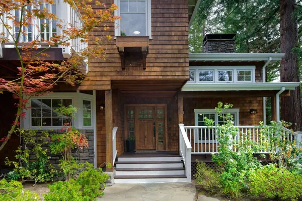 a dining room with furniture a rug and wooden floor