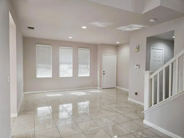 a view of entryway with stairs