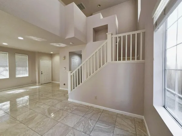 a view of an entryway with stairs