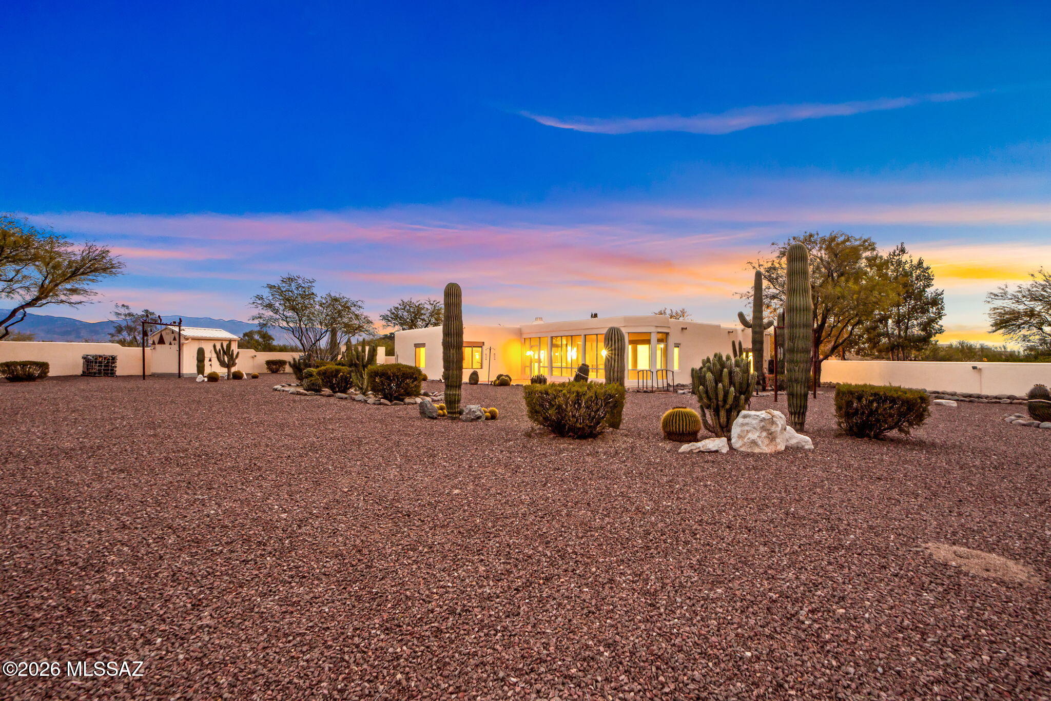 3655 North Harrison Road Tucson, AZ 85749 - Photo 44 of 51 a view of a road with a building in the background