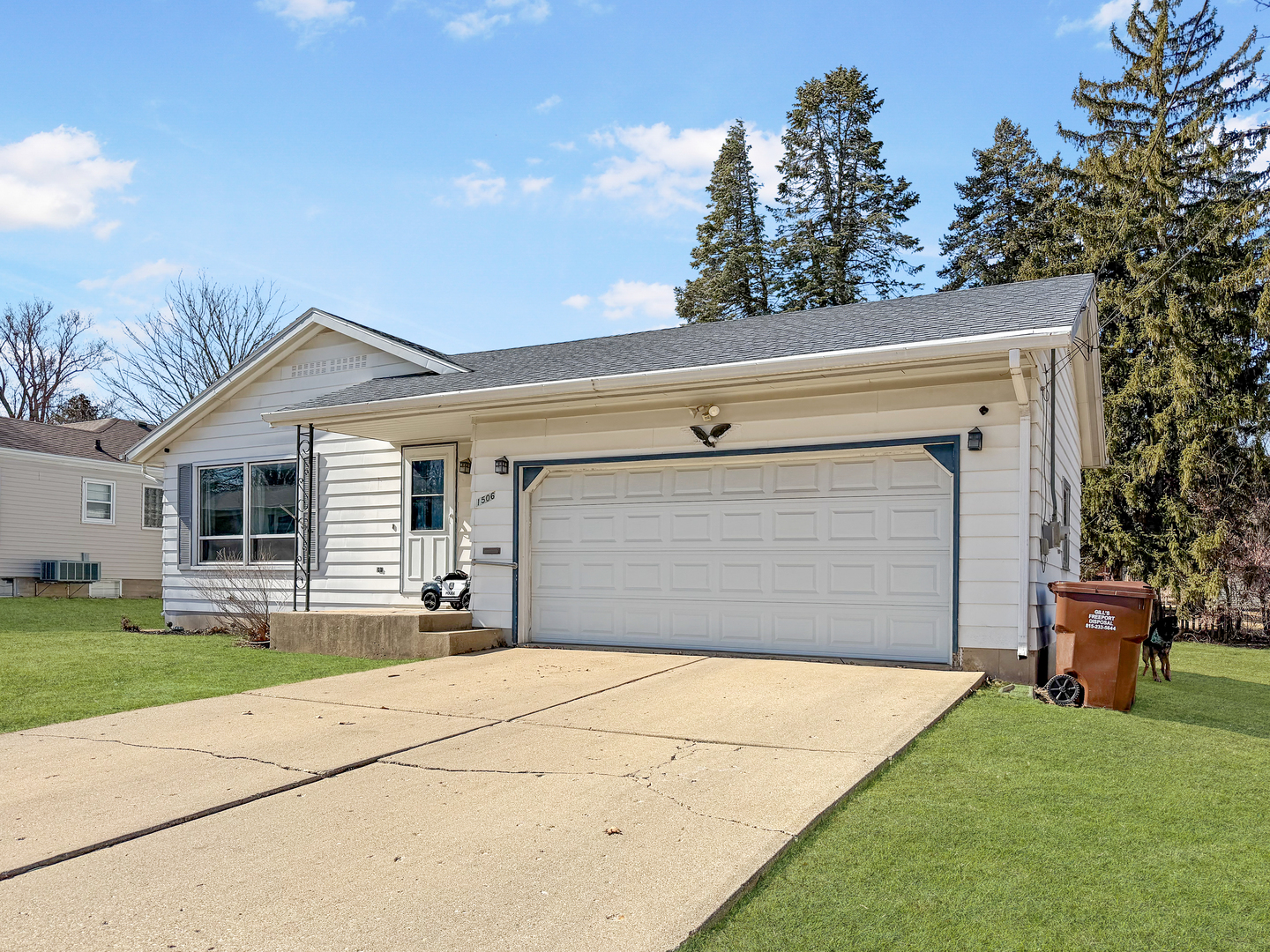 1506 South Walnut Avenue Freeport, IL 61032 - Photo 24 of 24 a front view of a house with a yard and garage
