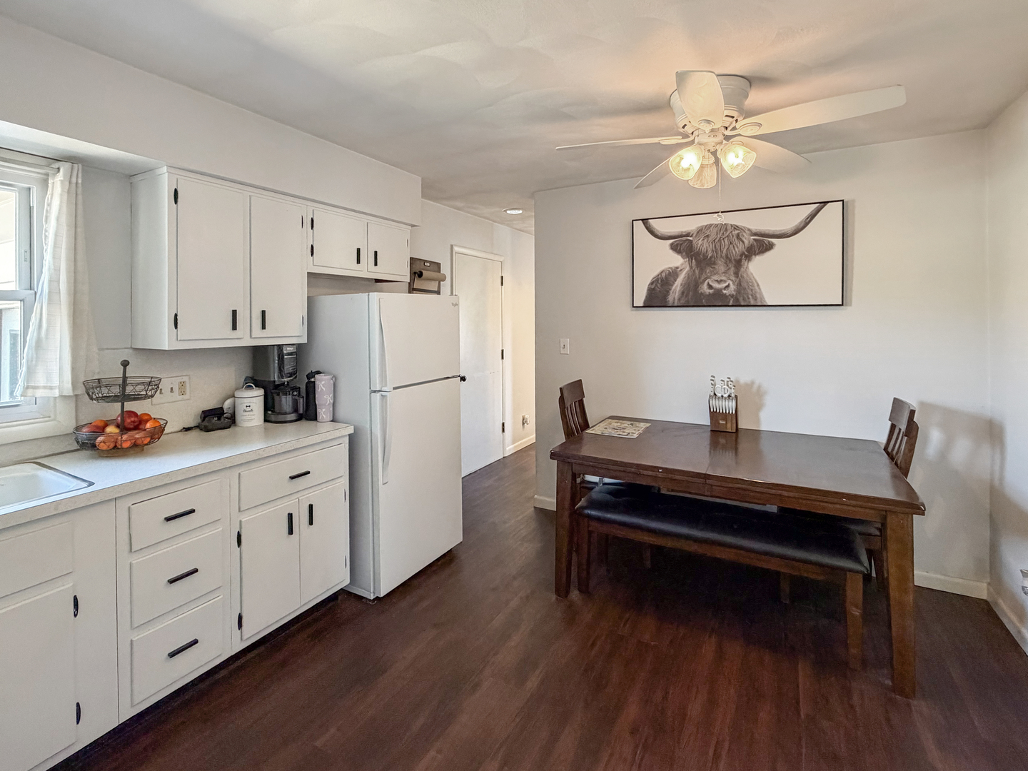 1506 South Walnut Avenue Freeport, IL 61032 - Photo 4 of 24 a room with cabinets and wooden floor