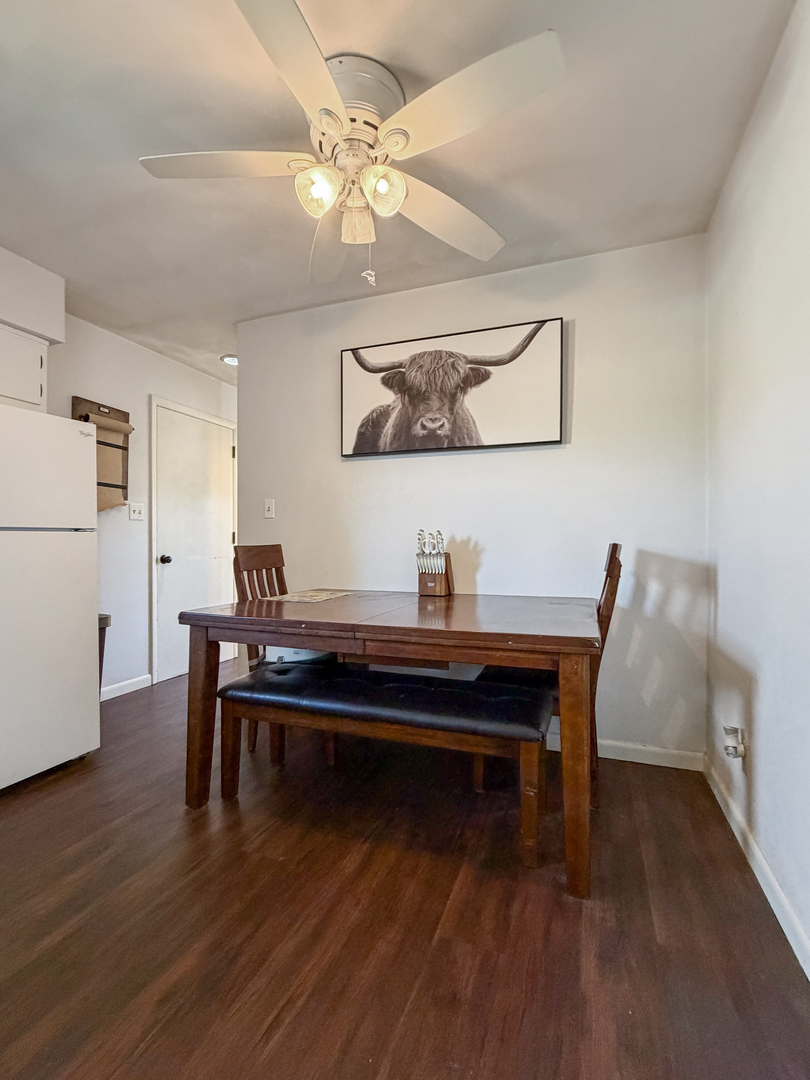 1506 South Walnut Avenue Freeport, IL 61032 - Photo 9 of 24 a view of a workspace with furniture and wooden floor