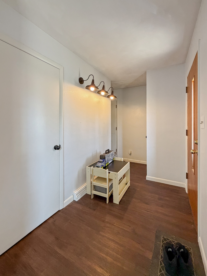 1506 South Walnut Avenue Freeport, IL 61032 - Photo 10 of 24 a room with a bed and furniture