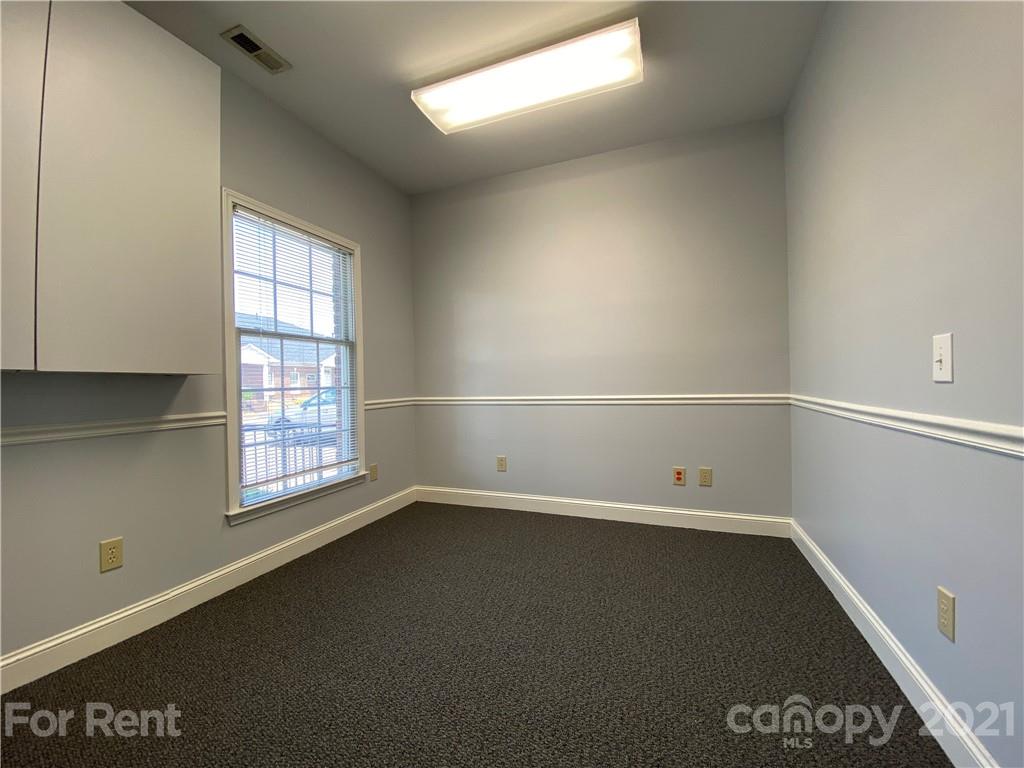 1552 Union Road, Unit B Gastonia, NC 28054 - Photo 12 of 12 an empty room with a window