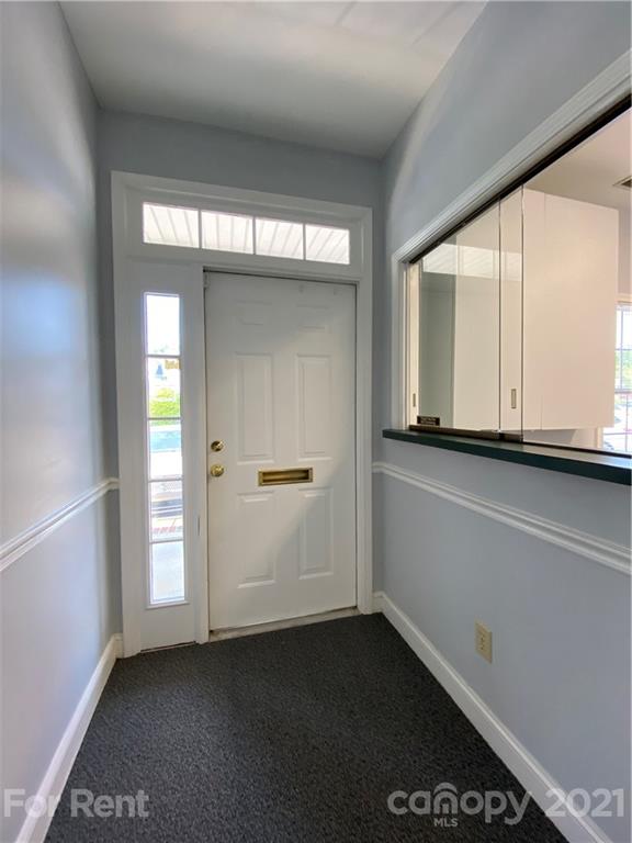 1552 Union Road, Unit B Gastonia, NC 28054 - Photo 5 of 12 a view of an empty room with a window