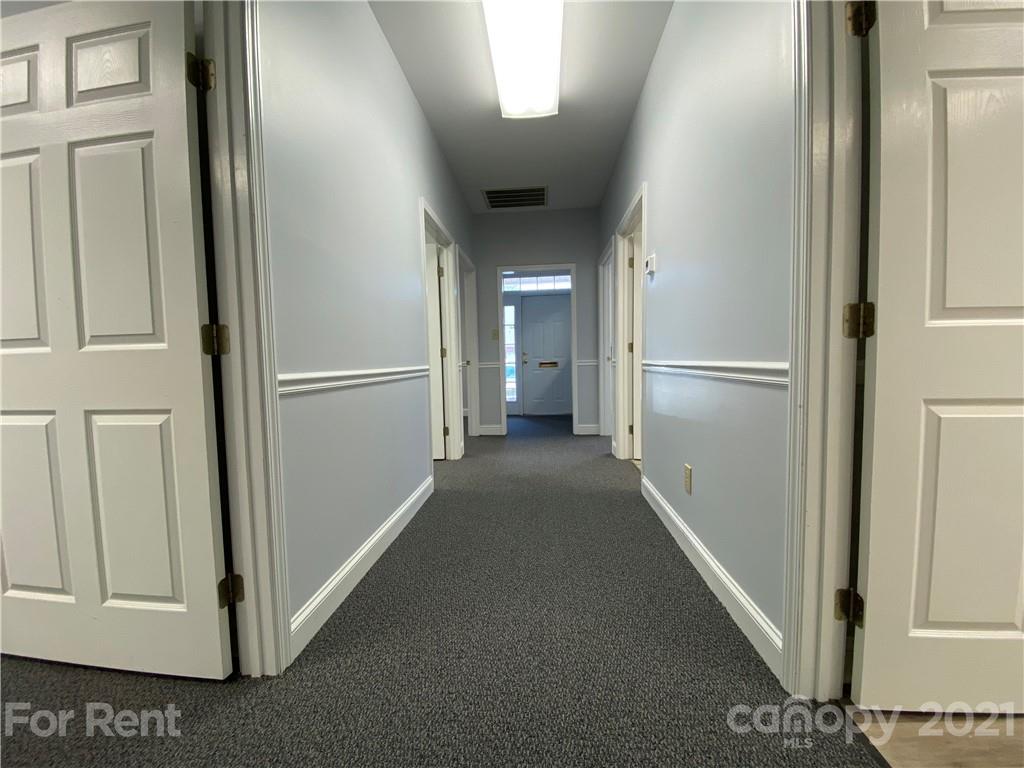 1552 Union Road, Unit B Gastonia, NC 28054 - Photo 8 of 12 a view of a hallway with white walls