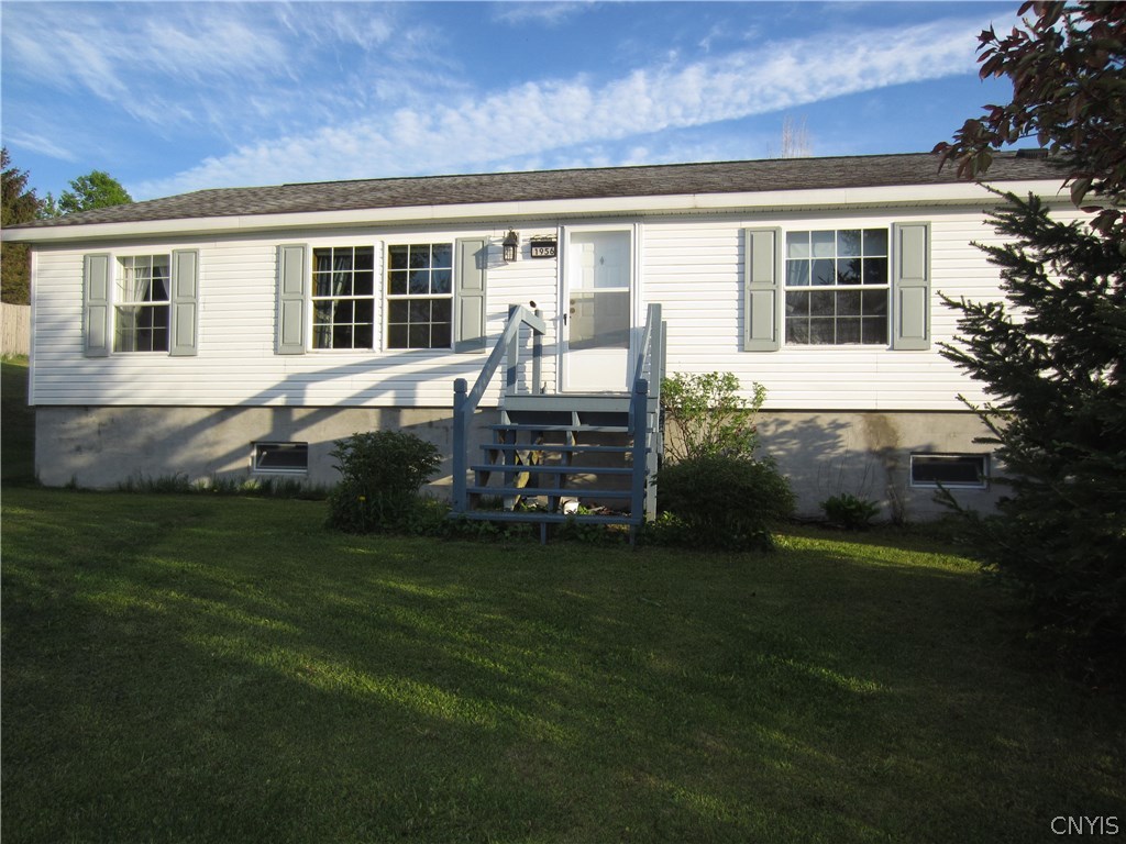 1956 Delphi Road Cazenovia, NY 13122 - Photo 1 of 1 Set atop a small knoll, with long views in all dir