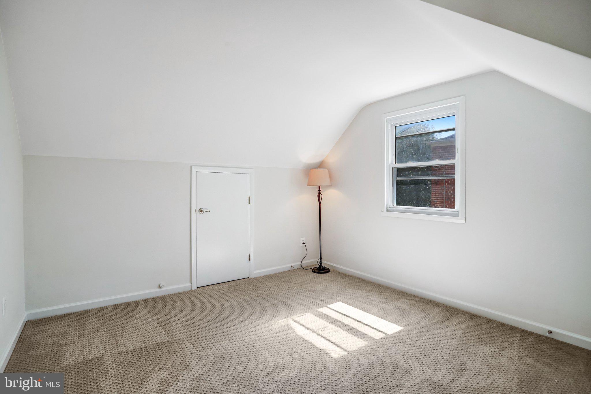 616 Ritchie Avenue Silver Spring, MD 20910 - Photo 21 of 37 a view of an empty room with a window