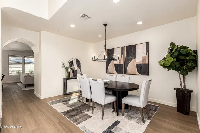 a view of a dining room with furniture