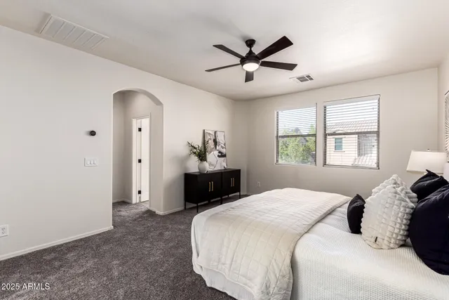 a bathroom with a shower and a sink