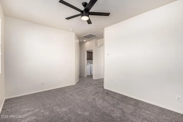 a bathroom with a toilet a sink a mirror a bathtub and shower