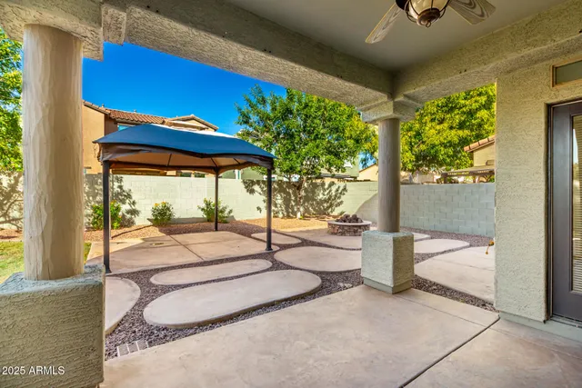 a view of swimming pool with outdoor seating