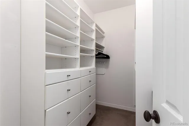 a view of an empty walk in closet