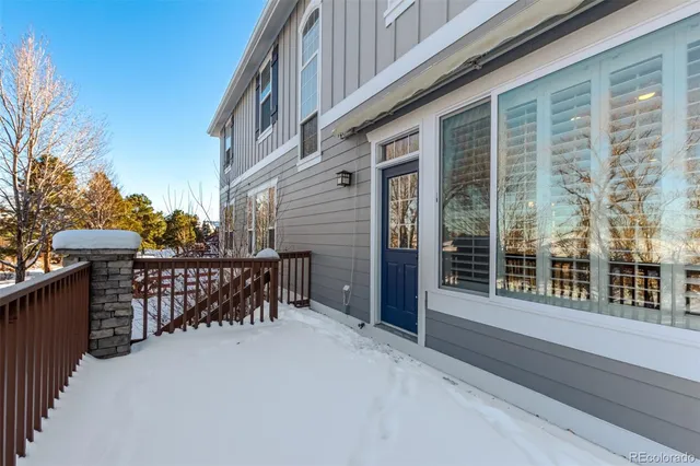 a view of a balcony with furniture