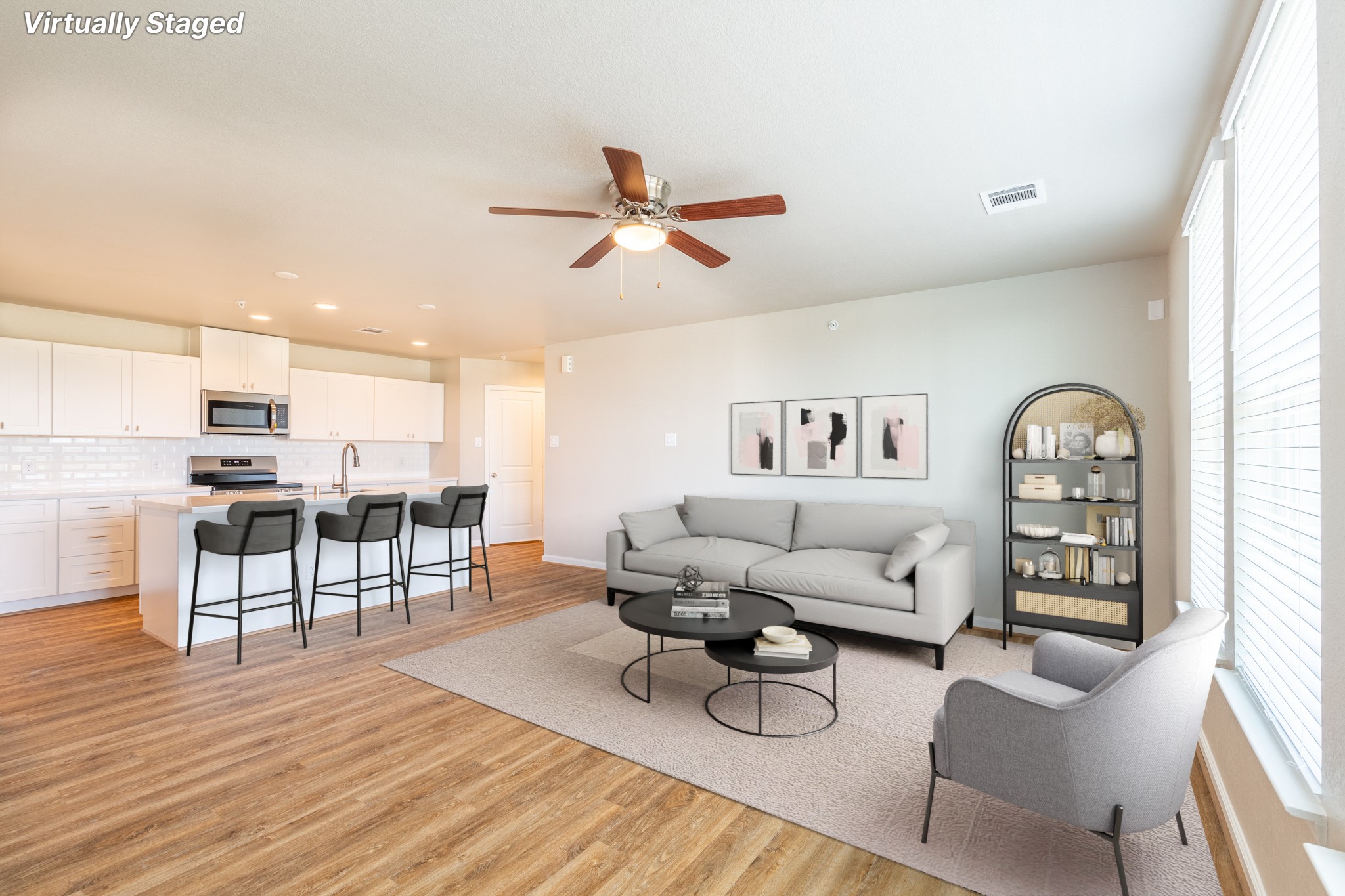 203 Park Place Circle, Unit D Waller, TX 77484 - Photo 7 of 29 a living room with furniture kitchen view and a wooden floor
