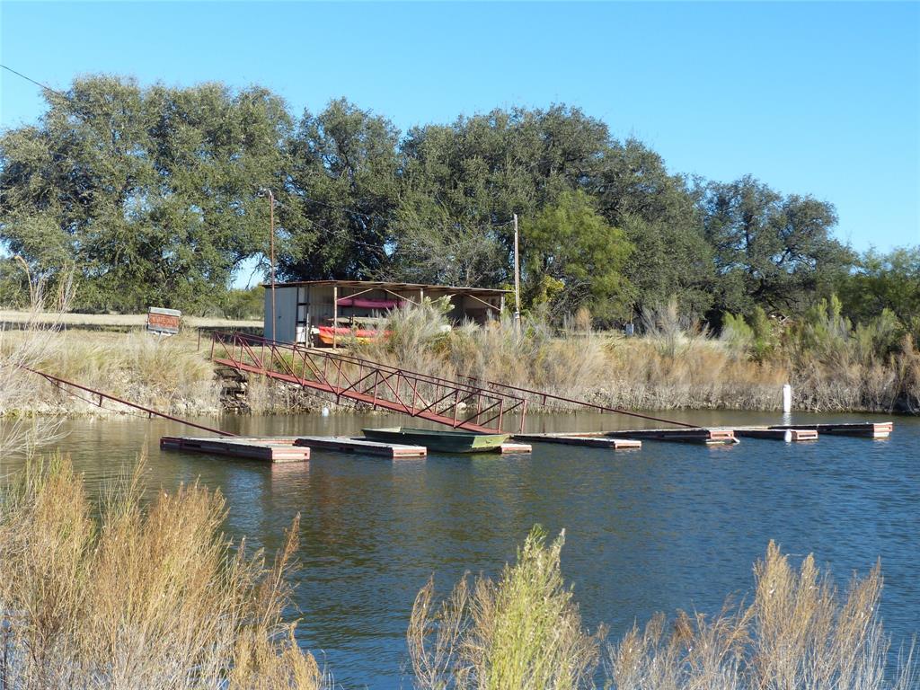 101 South Loop Drive Brady, TX 76825 - Photo 31 of 34 an aerial view of a house with a lake view