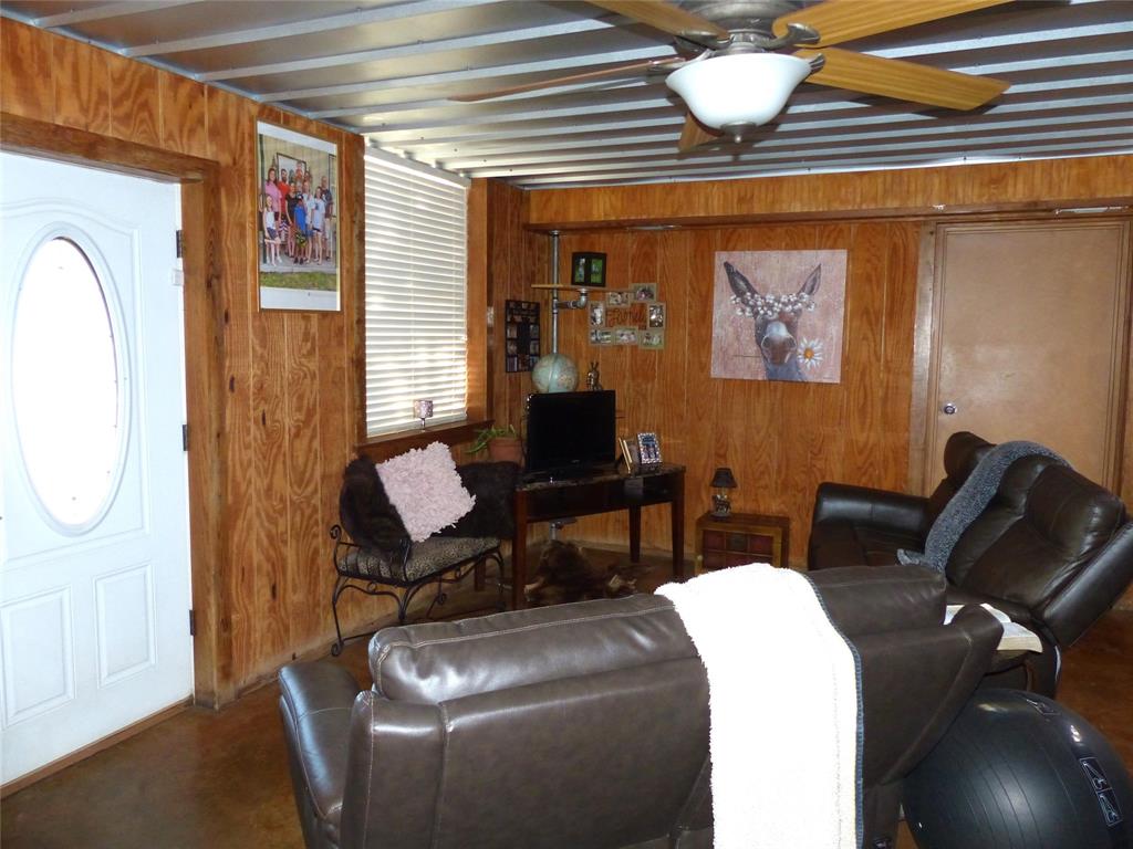 101 South Loop Drive Brady, TX 76825 - Photo 8 of 34 a living room with furniture and a window