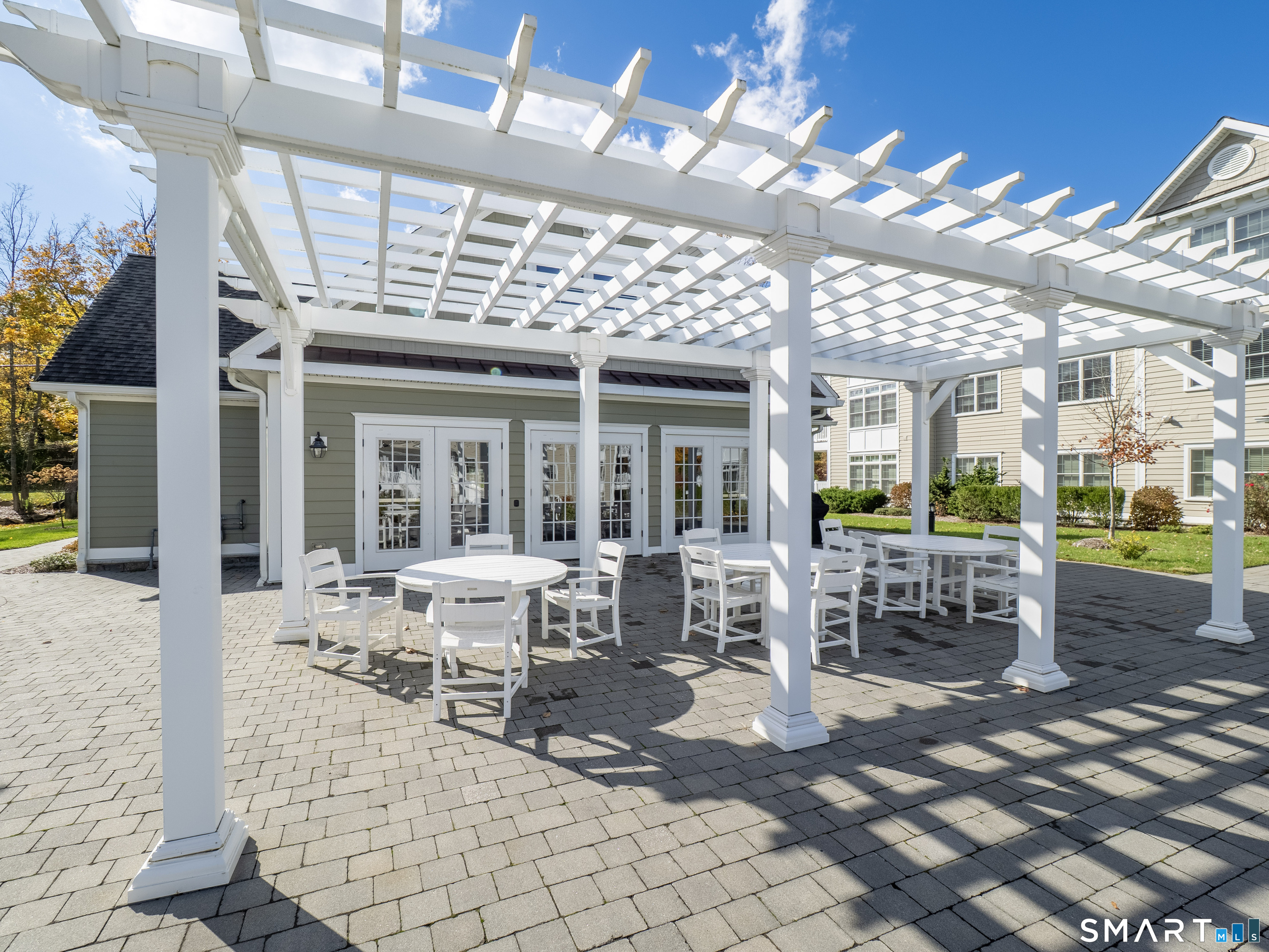 77 Sunset Lane, Unit 335 Ridgefield, CT 06877 - Photo 18 of 25 a view of a building with sitting space