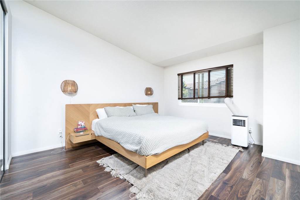 3707 Calle Curacso Riverside, CA 92503 - Photo 18 of 43 a bedroom with a bed and window