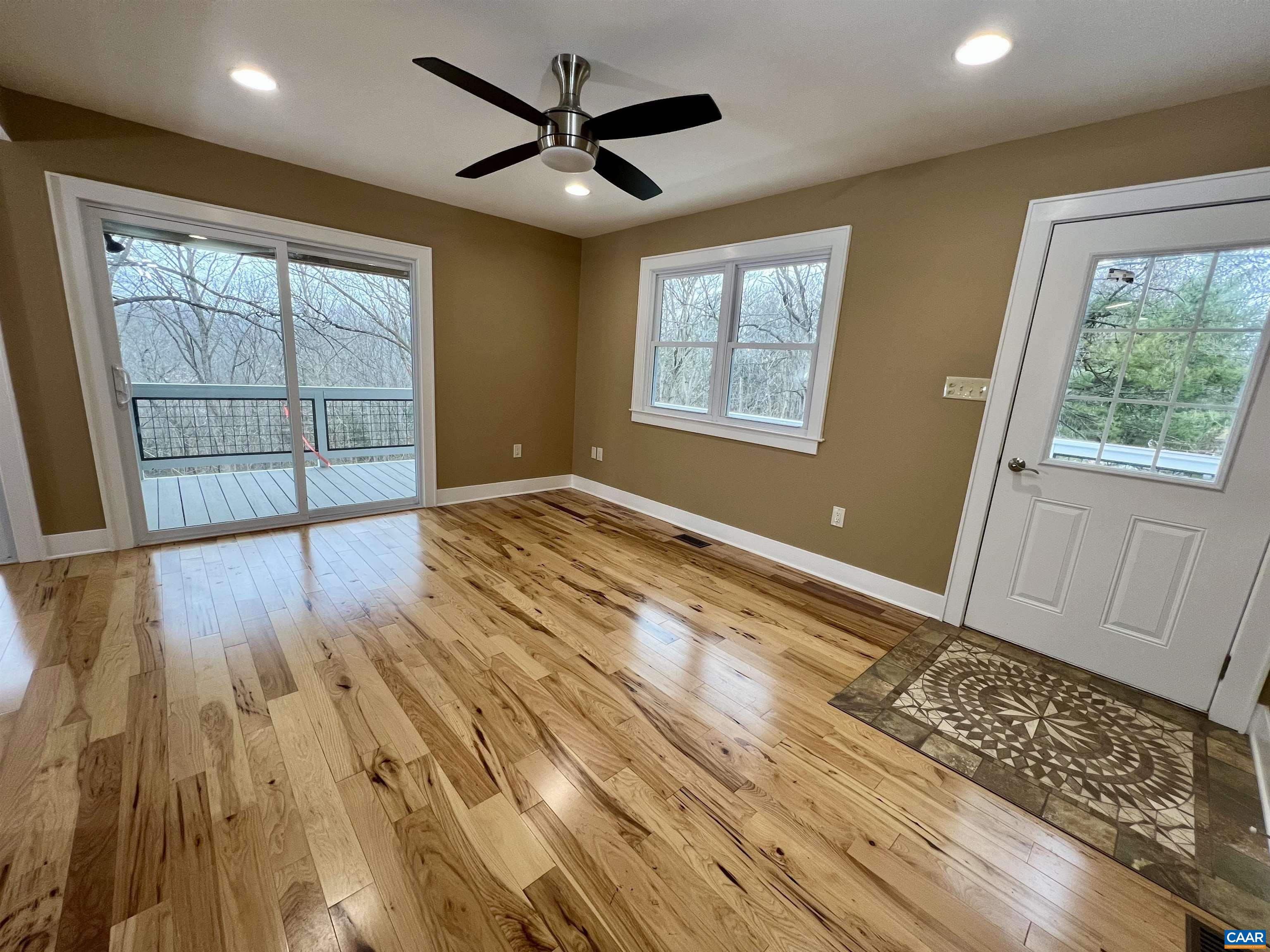 8272 Faber Road Faber, VA 22938 - Photo 12 of 44 a view of an empty room with a window and wooden floor