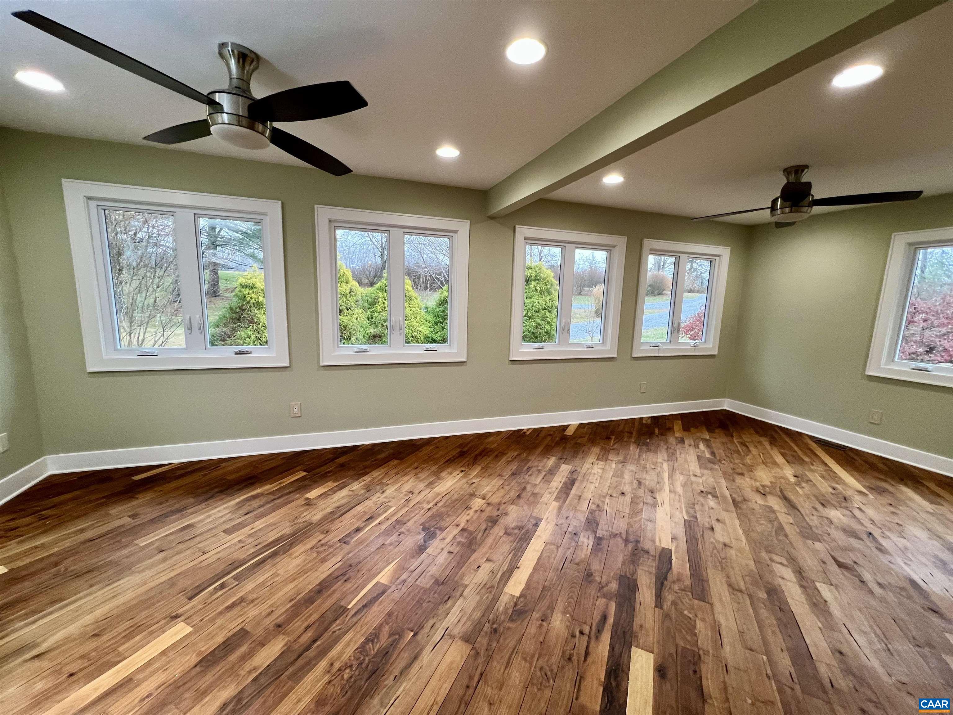 8272 Faber Road Faber, VA 22938 - Photo 14 of 44 a view of an empty room with wooden floor and a window