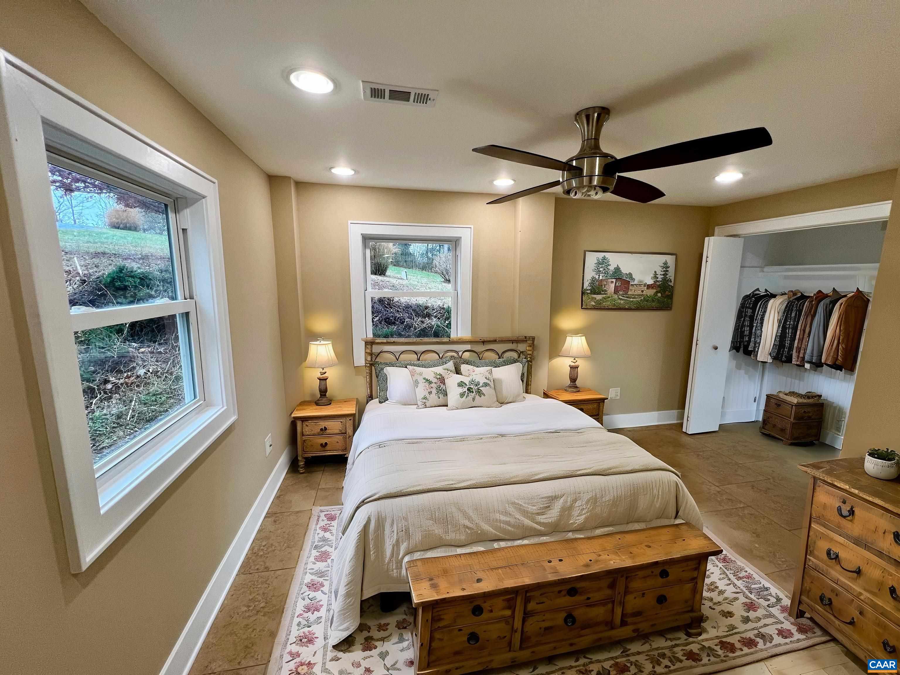 8272 Faber Road Faber, VA 22938 - Photo 21 of 44 a bedroom with a large bed and a window