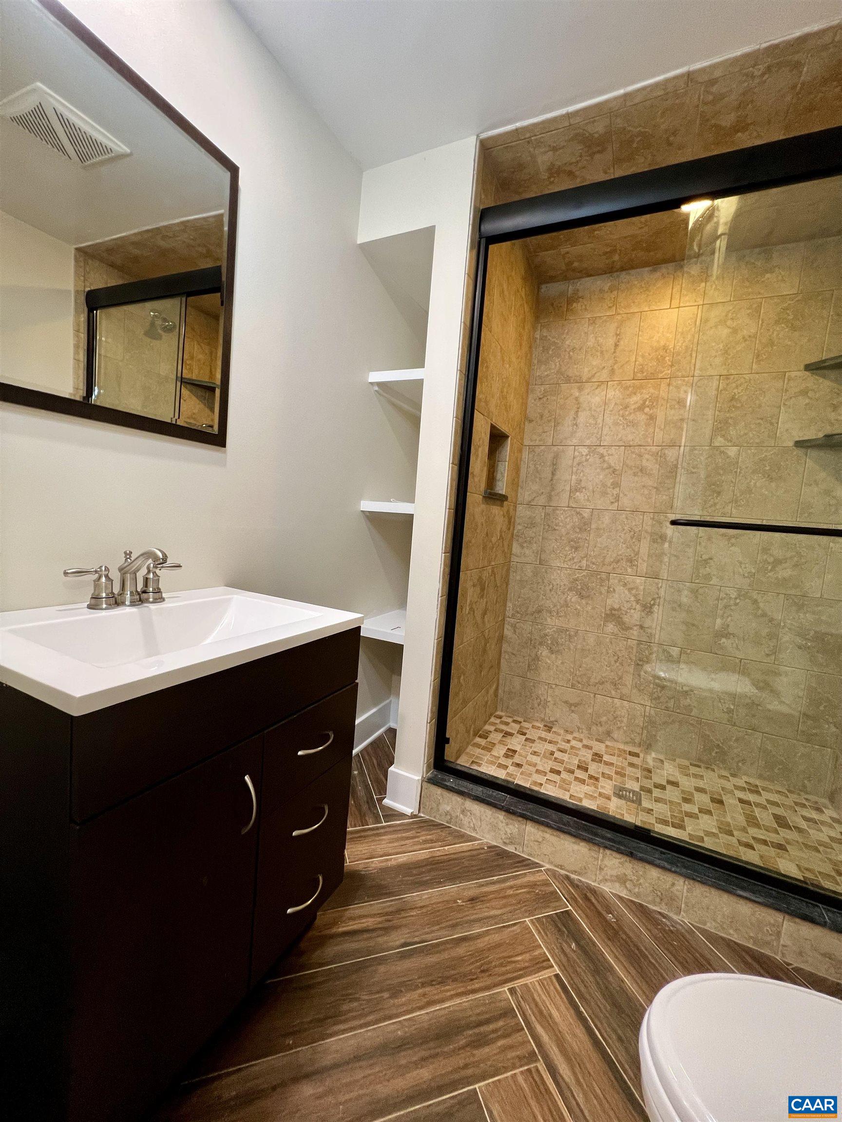 8272 Faber Road Faber, VA 22938 - Photo 24 of 44 a bathroom with a sink and a mirror