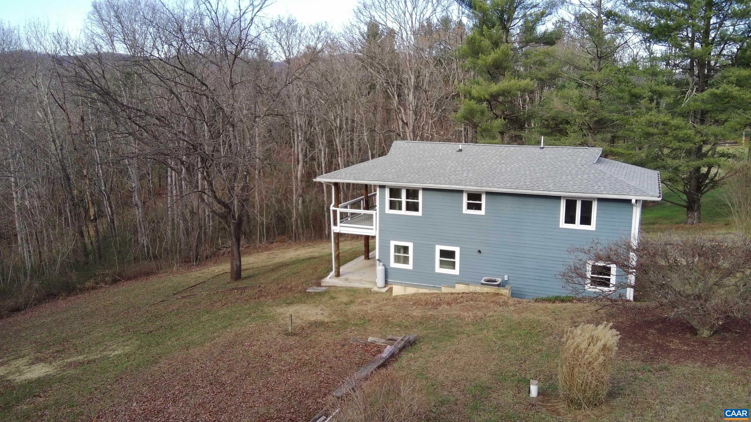 8272 Faber Road Faber, VA 22938 - Photo 3 of 44 front view of a house with a yard