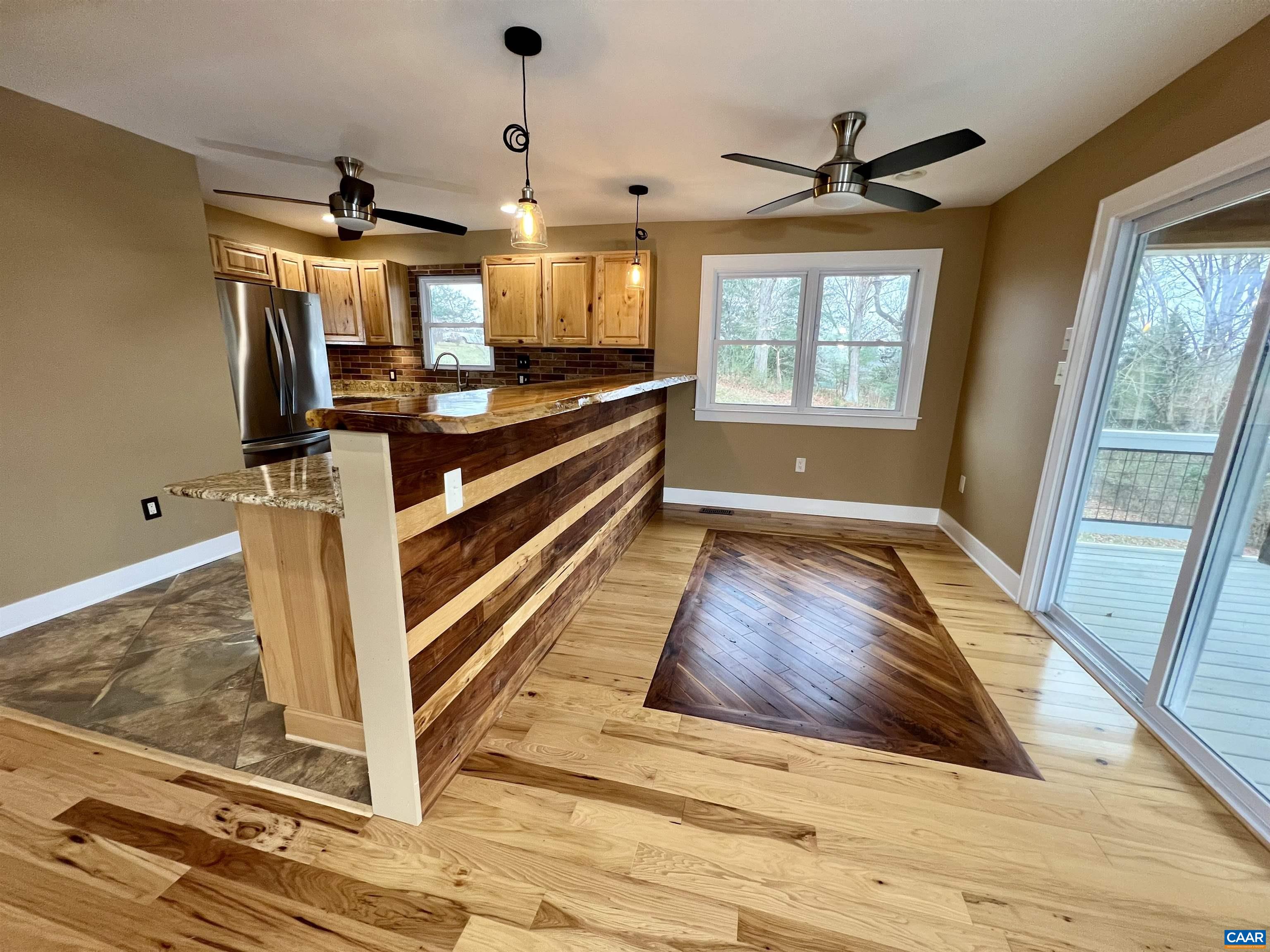 8272 Faber Road Faber, VA 22938 - Photo 9 of 44 a view of wooden floor and windows in a room