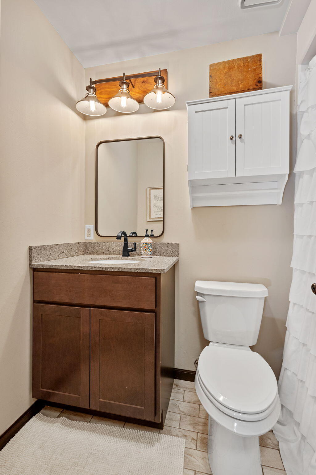 5592 East 1100th Street North Demotte, IN 46310 - Photo 39 of 77 a bathroom with a toilet sink and mirror