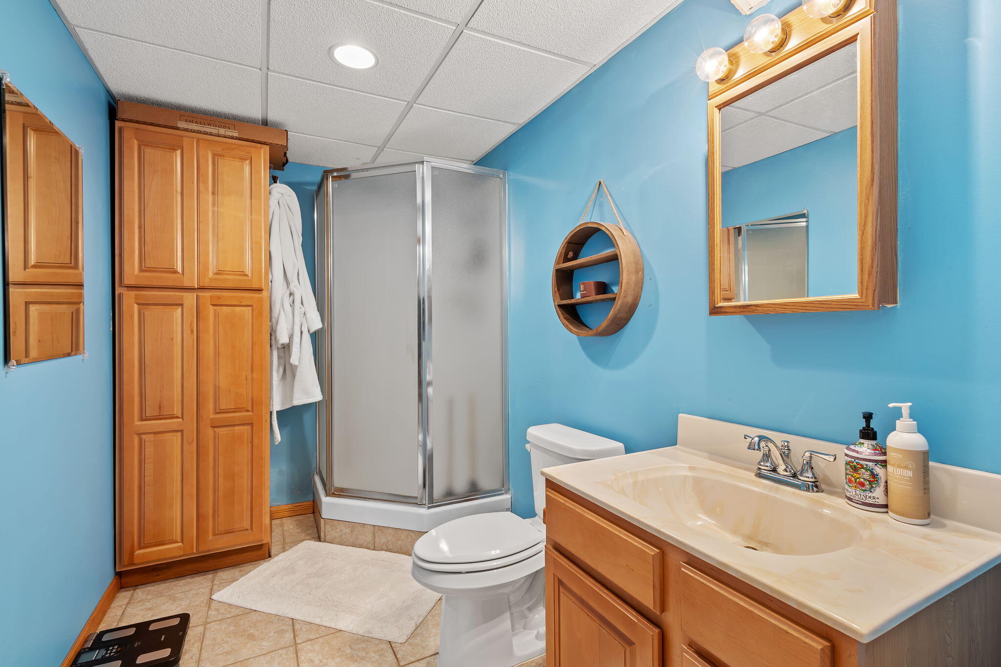 5592 East 1100th Street North Demotte, IN 46310 - Photo 41 of 77 a bathroom with a sink a toilet and shower curtain