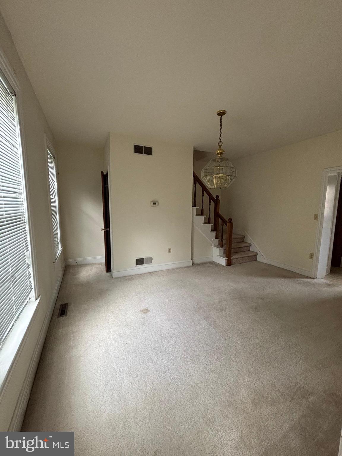5 South State Street Dover, DE 19901 - Photo 14 of 20 a view of a livingroom with a staircase