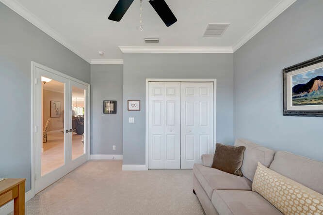 636 Gossamer Wing Way Sebastian, FL 32958 - Photo 18 of 36 a living room with furniture and a ceiling fan