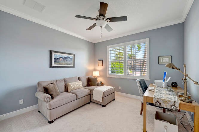 636 Gossamer Wing Way Sebastian, FL 32958 - Photo 19 of 36 a living room with furniture and a window