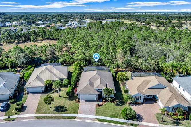 636 Gossamer Wing Way Sebastian, FL 32958 - Photo 29 of 34 an aerial view of a house with a yard