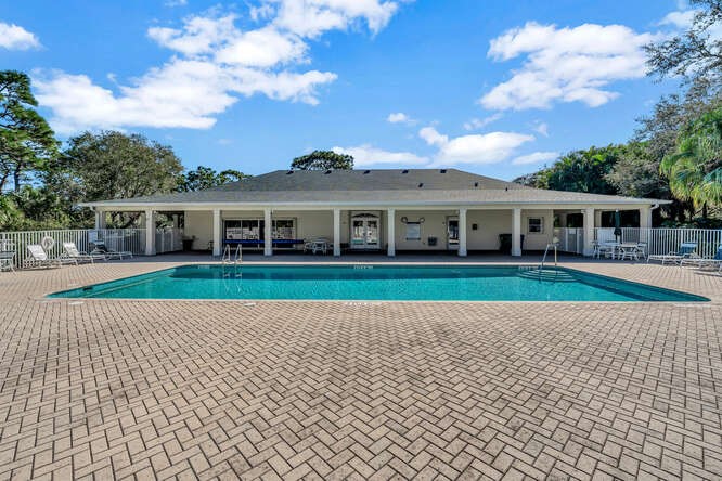 636 Gossamer Wing Way Sebastian, FL 32958 - Photo 29 of 36 a view of house with a yard