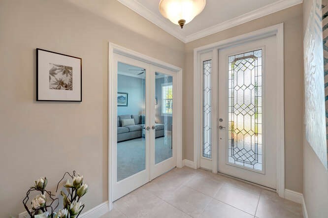 636 Gossamer Wing Way Sebastian, FL 32958 - Photo 3 of 34 a view of an entryway with wooden floor