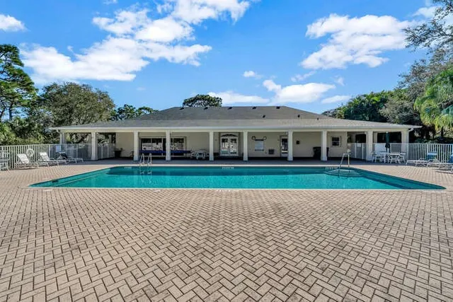 a view of a house with swimming pool