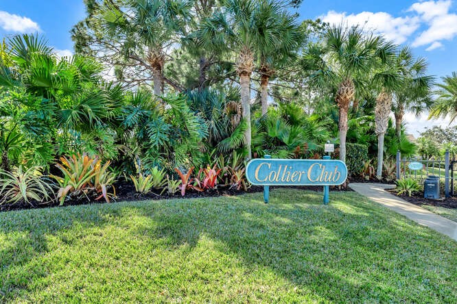 636 Gossamer Wing Way Sebastian, FL 32958 - Photo 32 of 36 a view of a backyard with a house and a bench