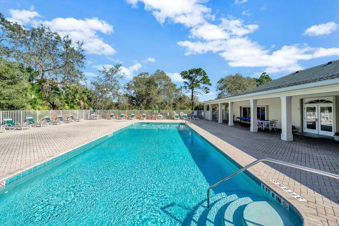 636 Gossamer Wing Way Sebastian, FL 32958 - Photo 32 of 34 a view of a house with swimming pool